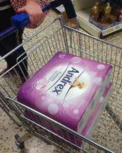 Andrex toilet paper in shopping trolley